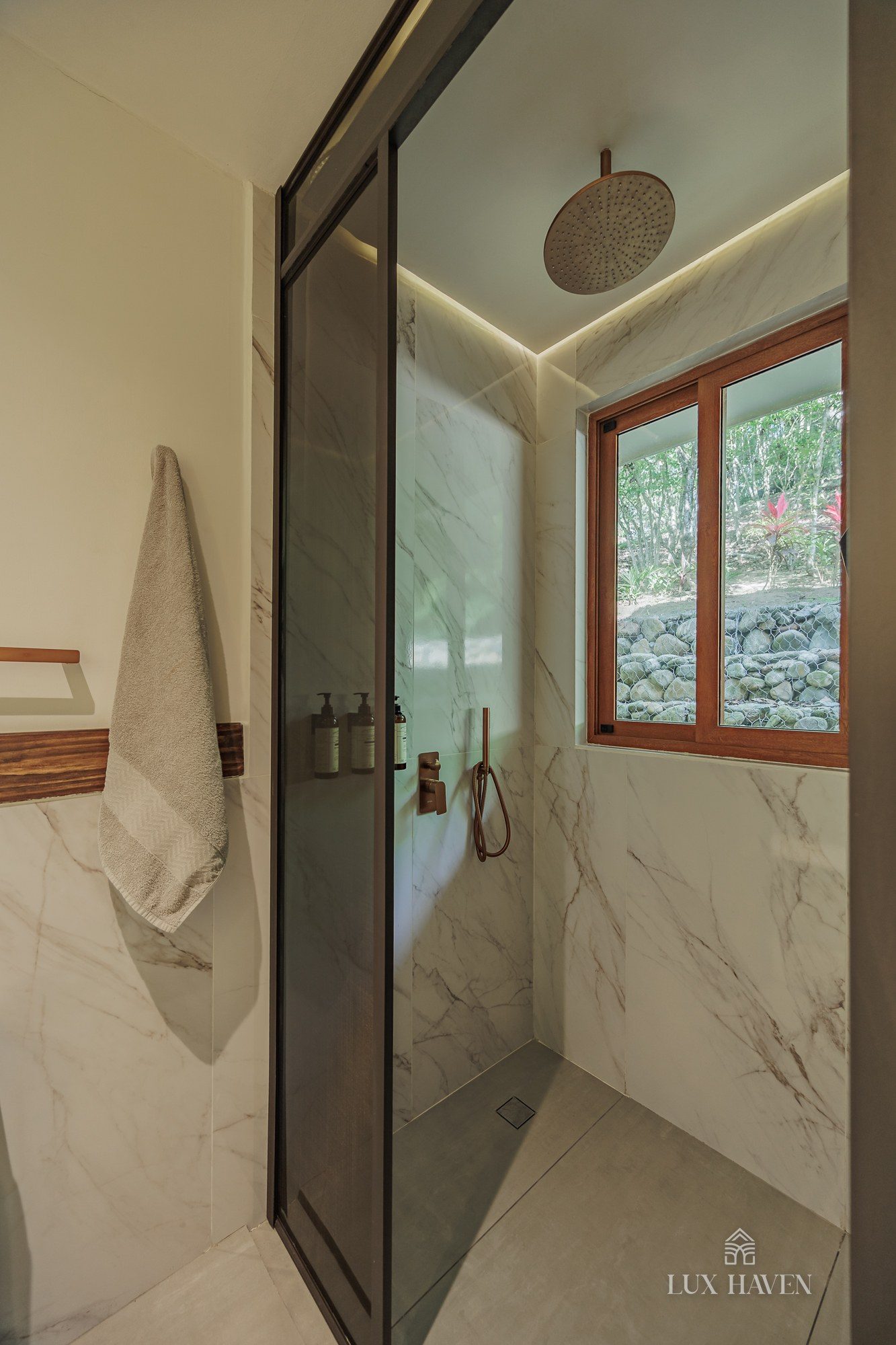 Marble rain shower with garden window